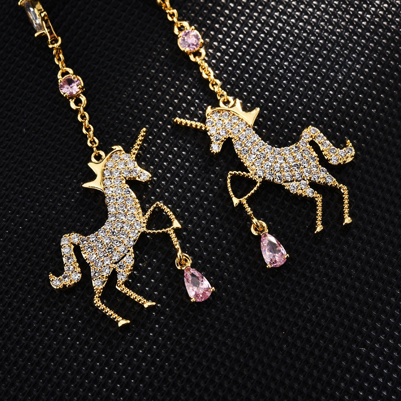 Crystal Unicorn Drop Earrings – Gold with Pink Gem Accents