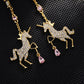 Crystal Unicorn Drop Earrings – Gold with Pink Gem Accents