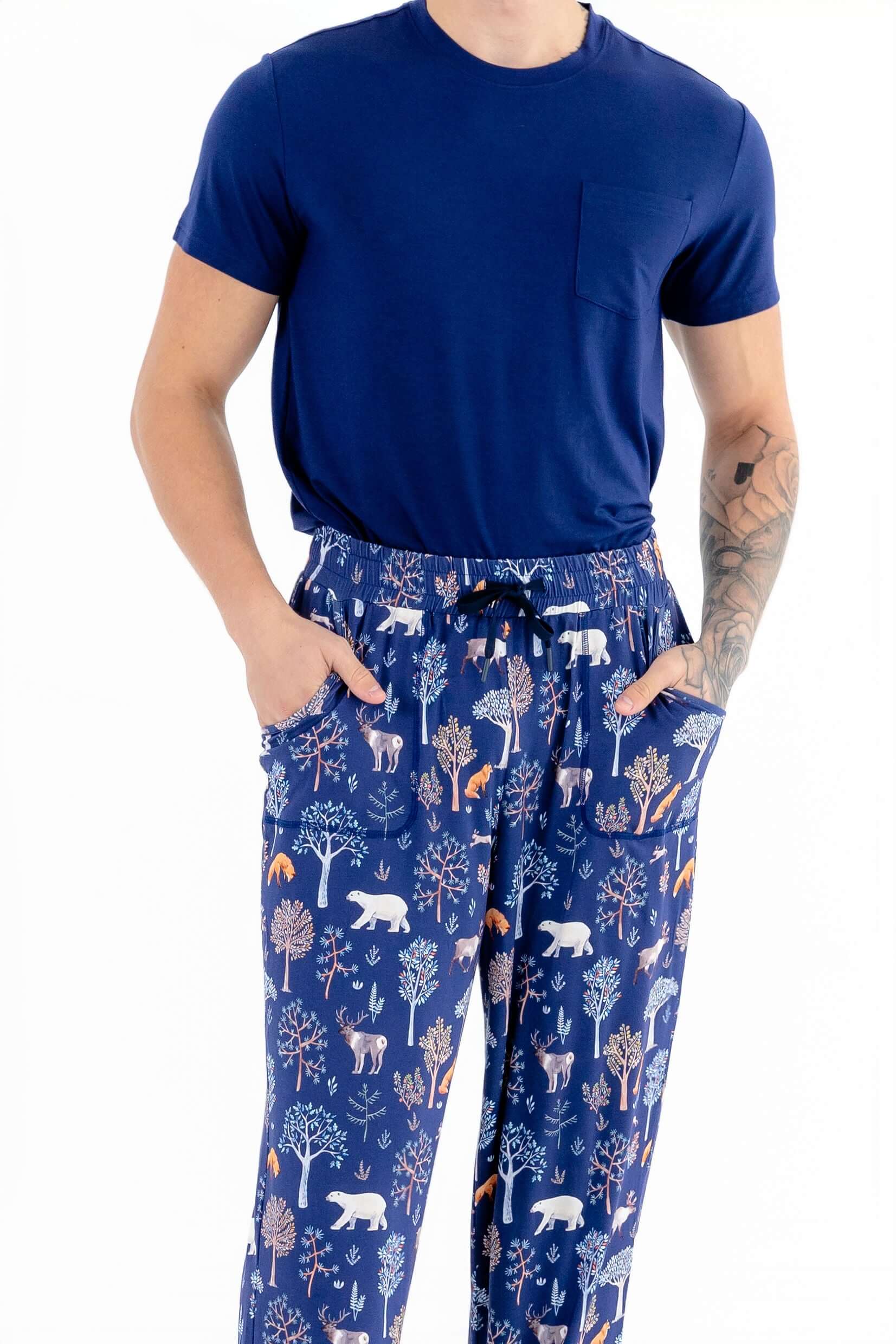 Front view of man wearing mens pajama set in Woodland Night print