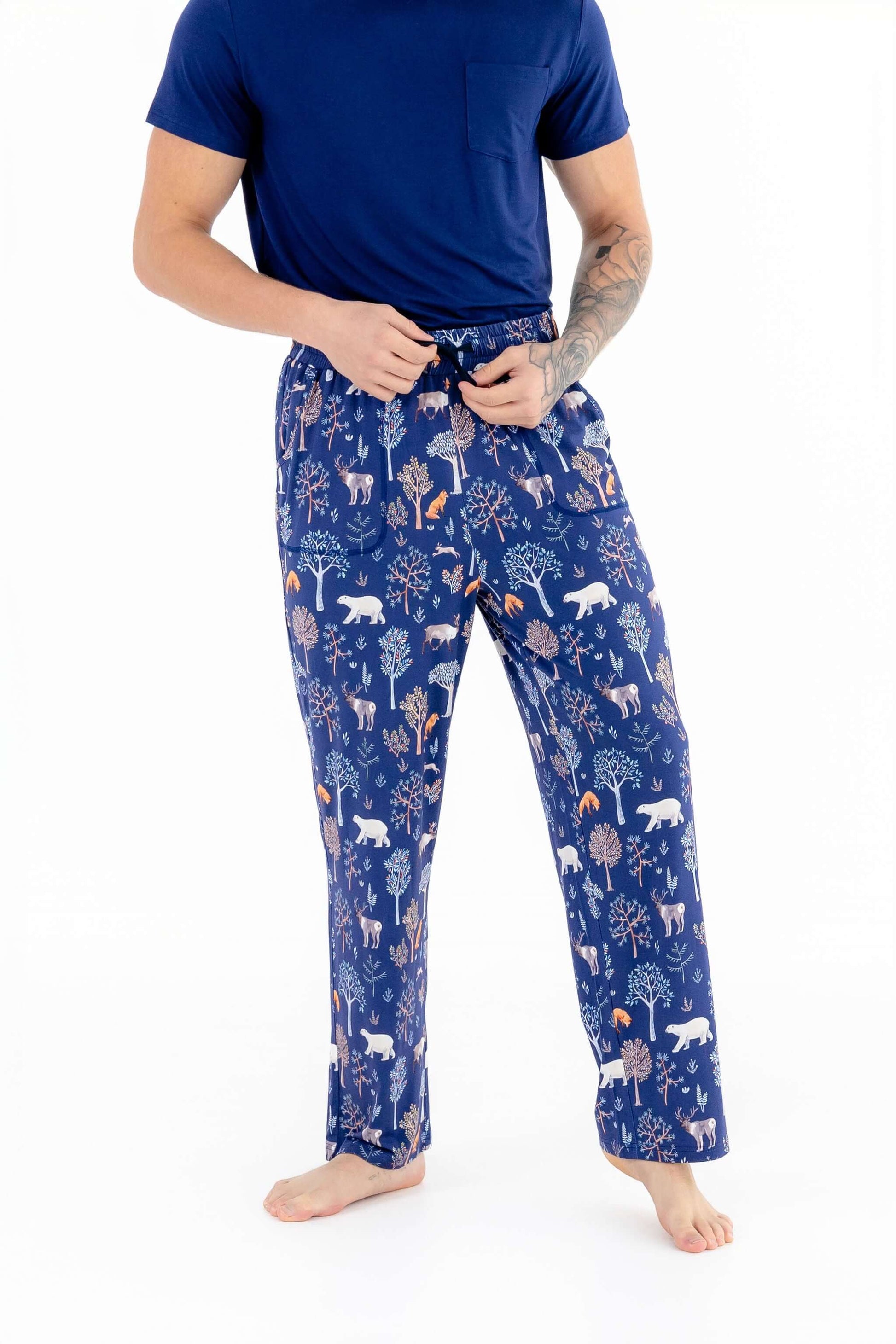 Front view of man wearing mens pajama set in Woodland Night print