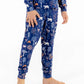 Front view of child wearing kids pajama set in Woodland Night forest print