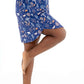 Woman wearing Woodland Night women nightshirt long sleeve in a playful pose showcasing the soft fabric and stylish design.