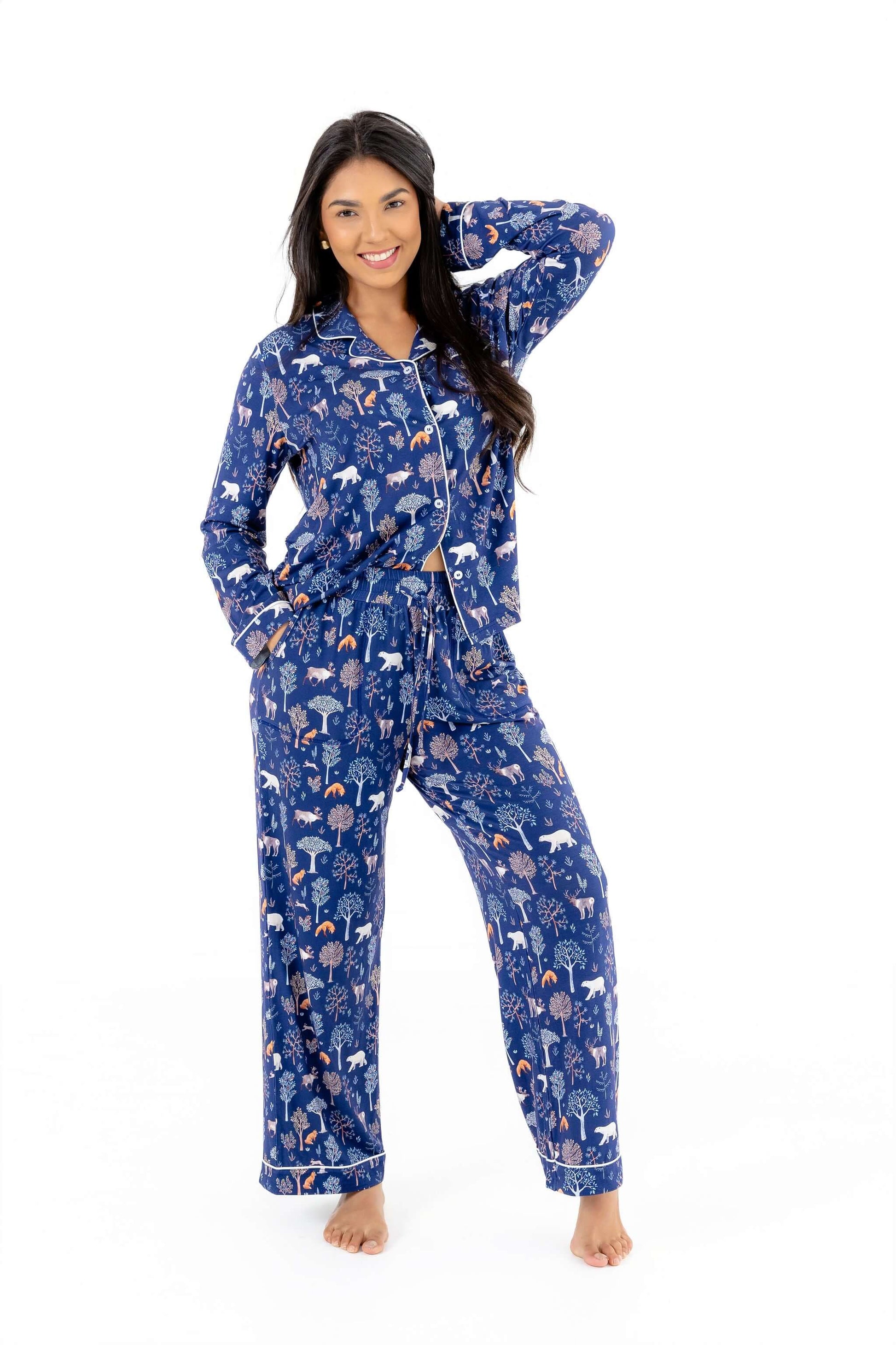 Model wearing Women TENCEL Modal pajama set in Woodland Midnight print, showcasing soft long sleeve PJ with woodland-inspired design.