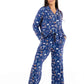Woman wearing Women TENCEL Modal pajama set in Woodland Midnight print, displaying comfort and style.
