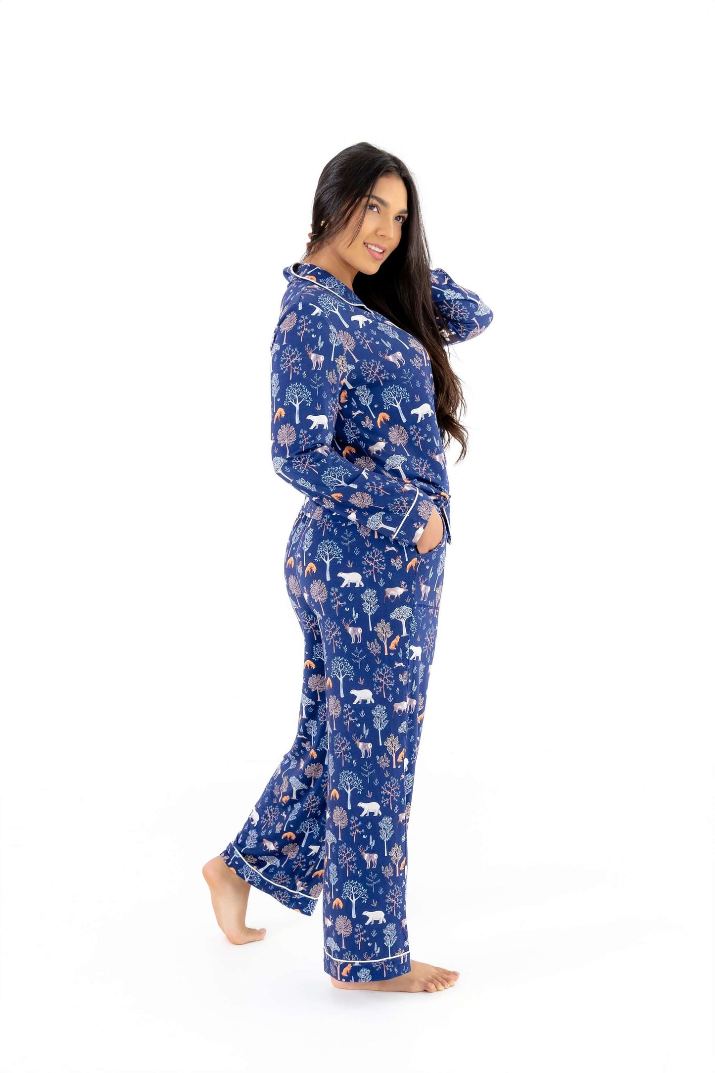 Woman wearing Women TENCEL Modal pajama set in Woodland Midnight print, showcasing soft and sustainable nightwear.