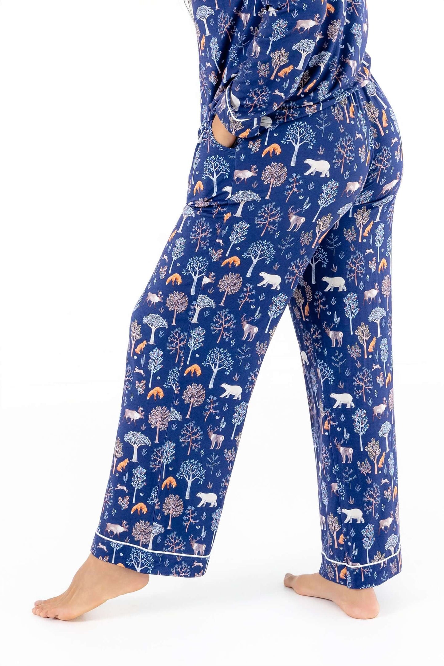 Women TENCEL Modal pajama set in Woodland Midnight print showcasing soft, breathable fabric with woodland design.