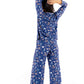 Woman wearing Women TENCEL Modal pajama set in Woodland Midnight print, showcasing long sleeve and sustainable comfort.