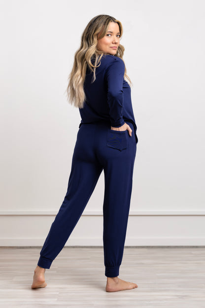 Women Modal Pajama Set model wearing navy blue crew neck and jogger pants, perfect for lounging and sleep.